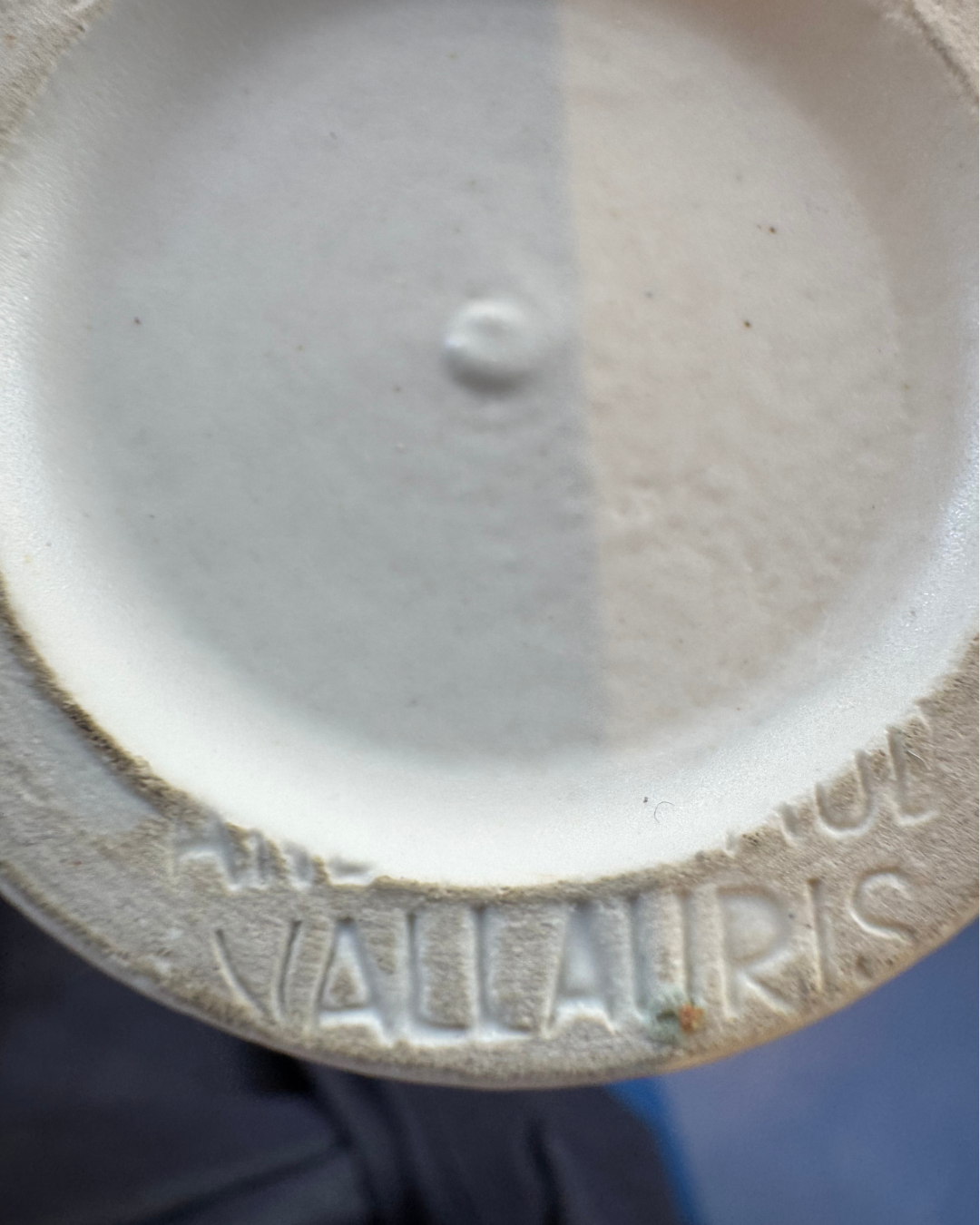 Impressed Vallauris mark with André Baud signature on ceramic pitcher.