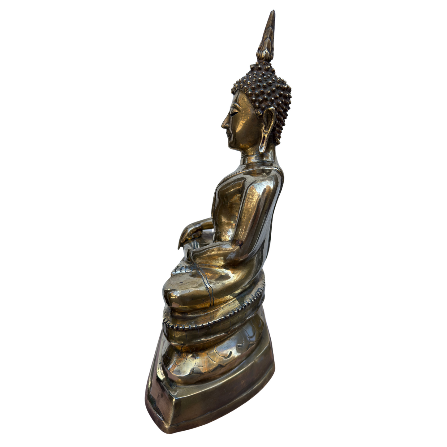 Side profile left showing draped robe folds and serene expression of bronze Buddha