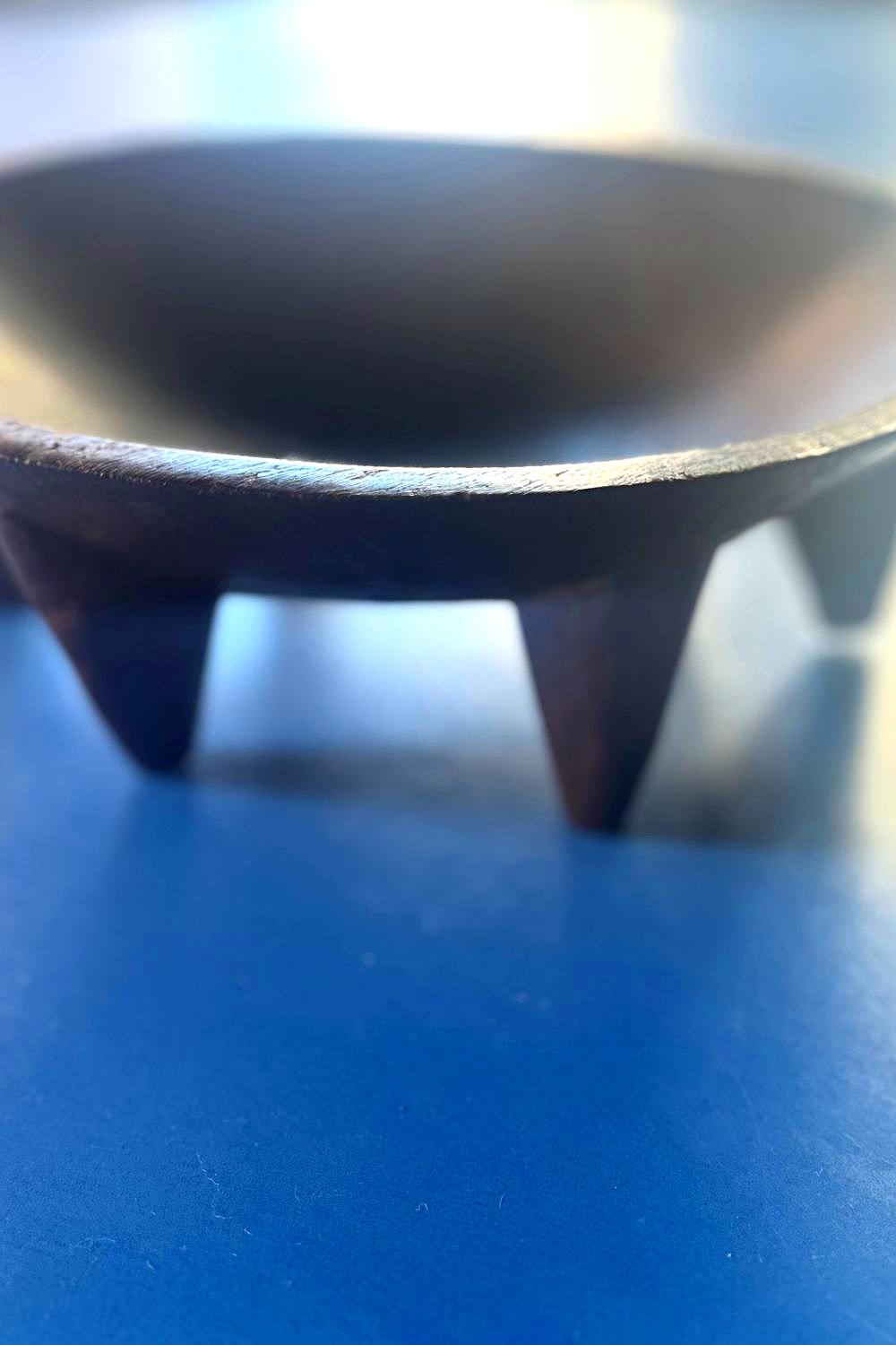 Side view of mid-20th-century hardwood Fijian yaqona ceremonial bowl