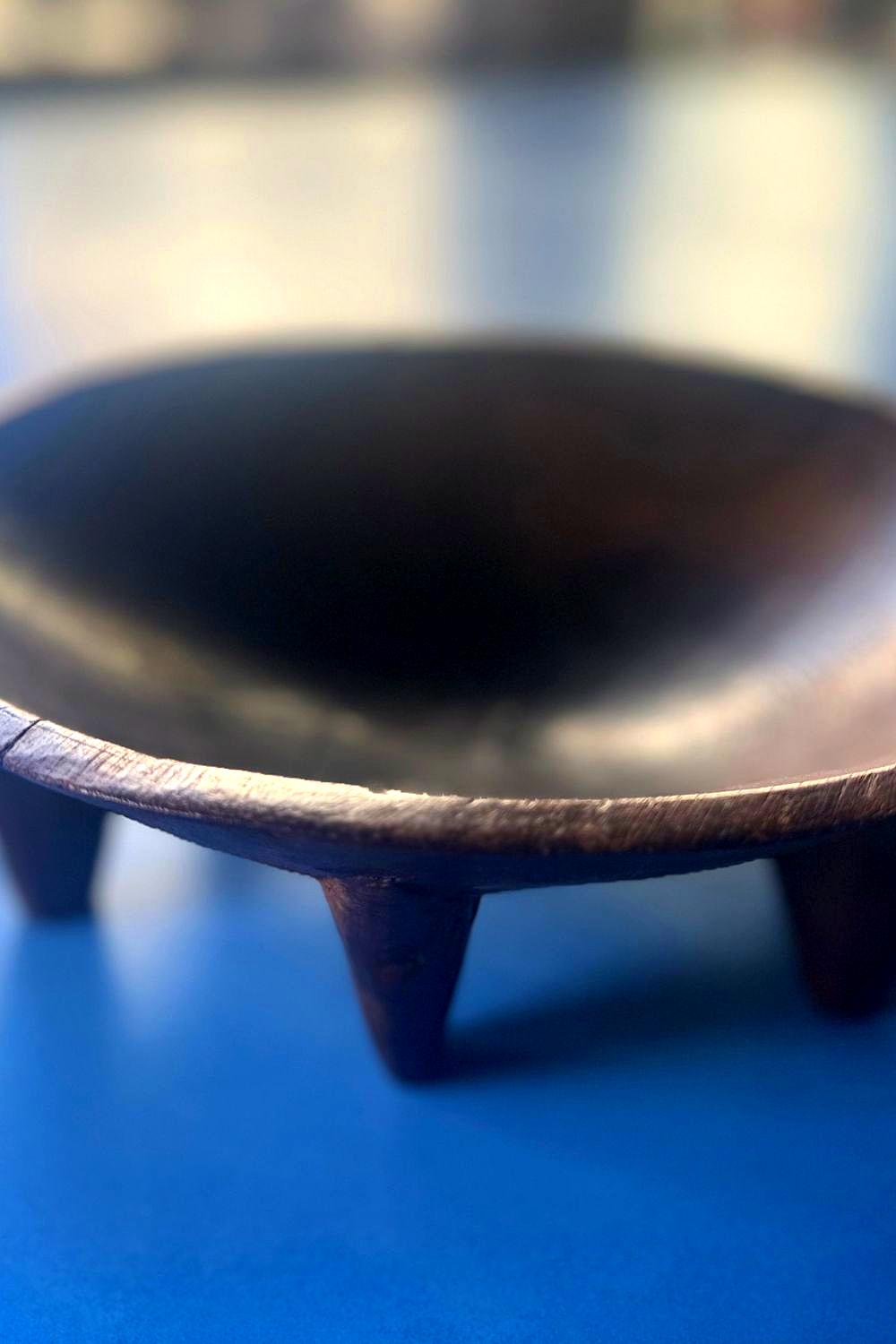 Close-up side detail of handmade vintage Fijian wooden tanoa bowl