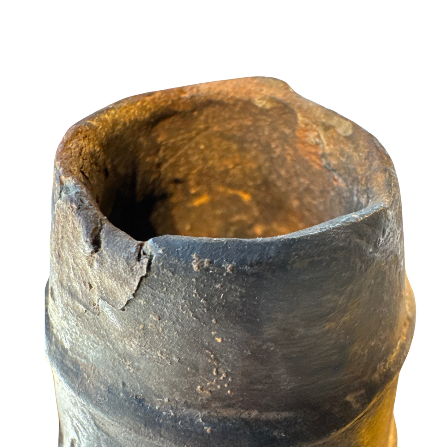 Incised diagonal bands and wave symbols around jug shoulder