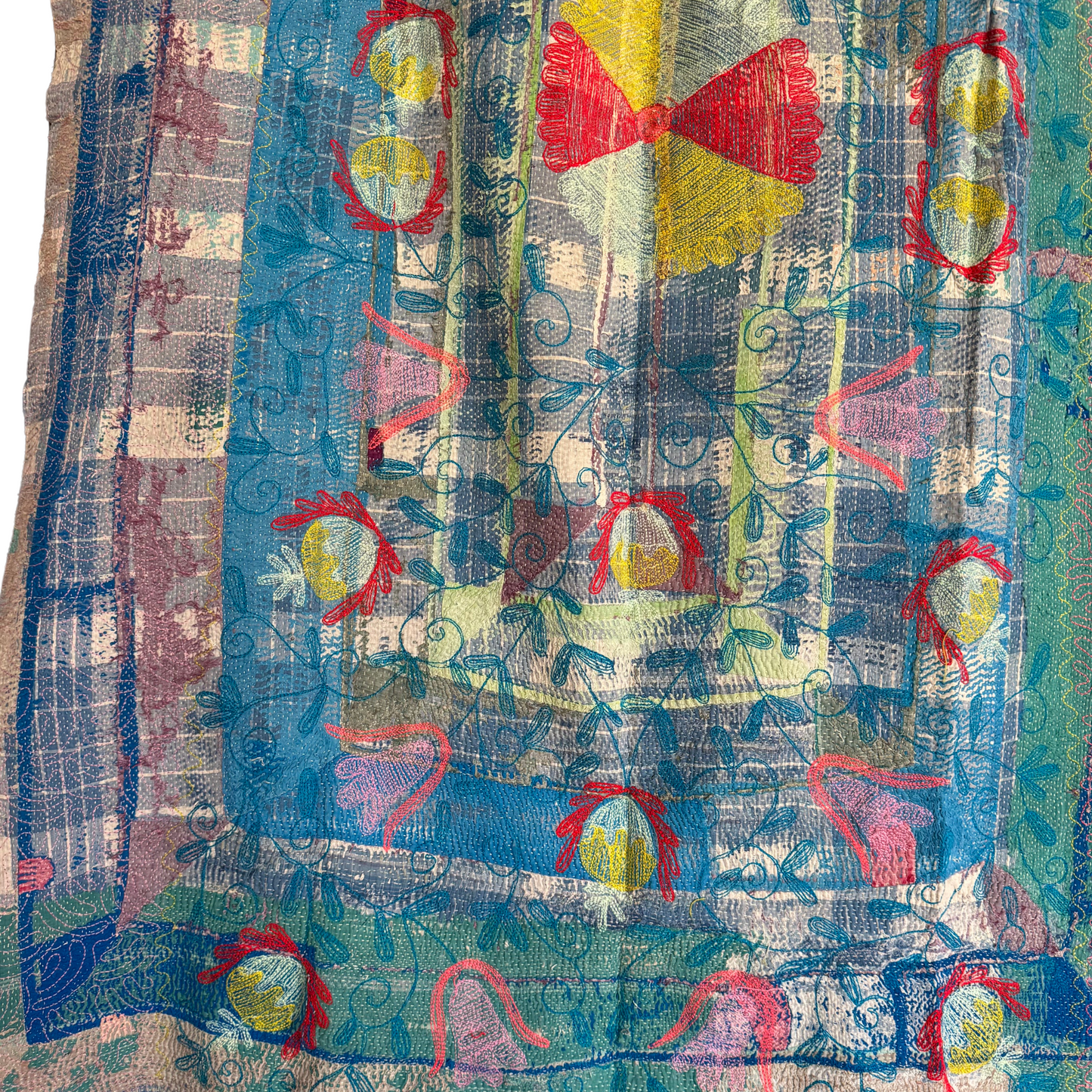 Back view detail of yellow-cream floral medallions and vine embroidery on Kantha cotton throw