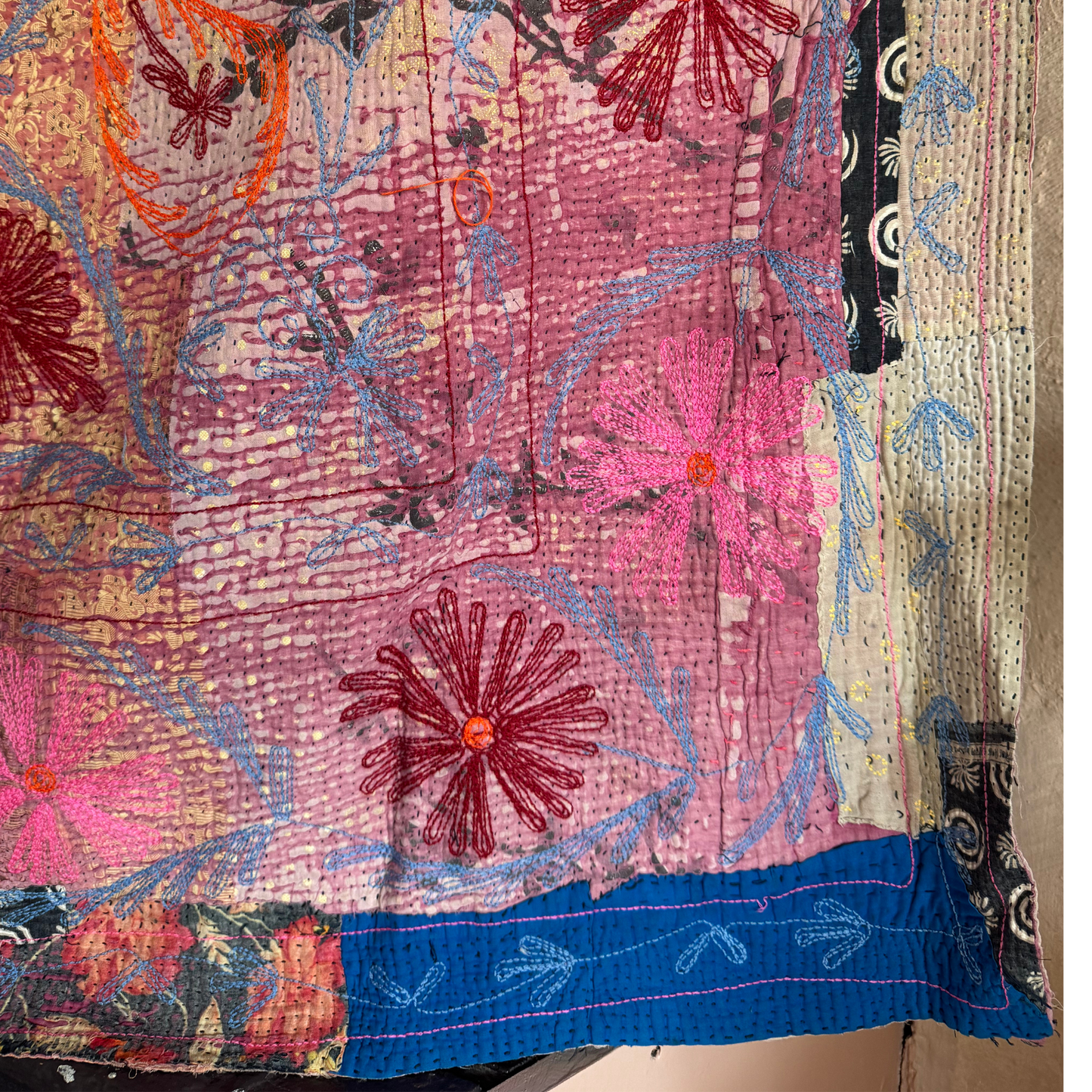 Kantha draped to showcase both embroidered front and stitched reverse
