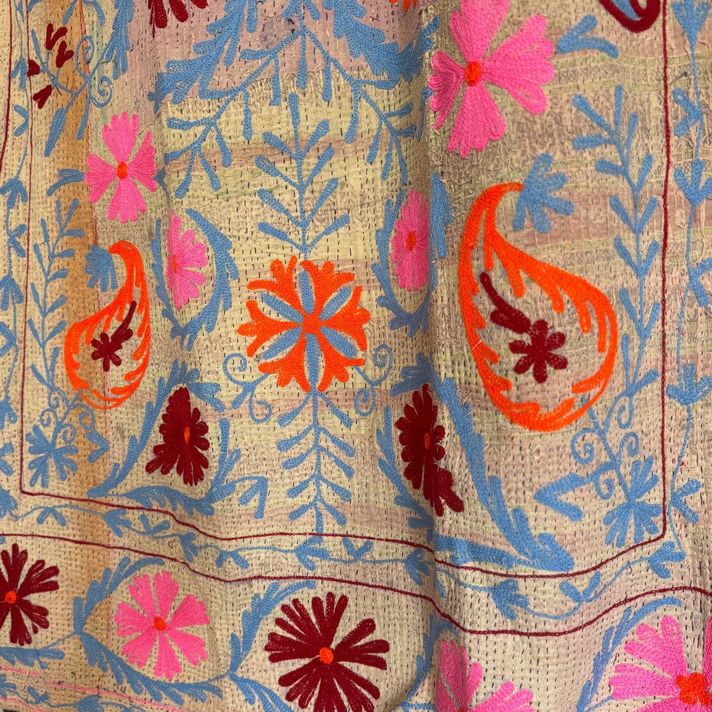 Detail showing layered sari scraps and tonal hand-stitching