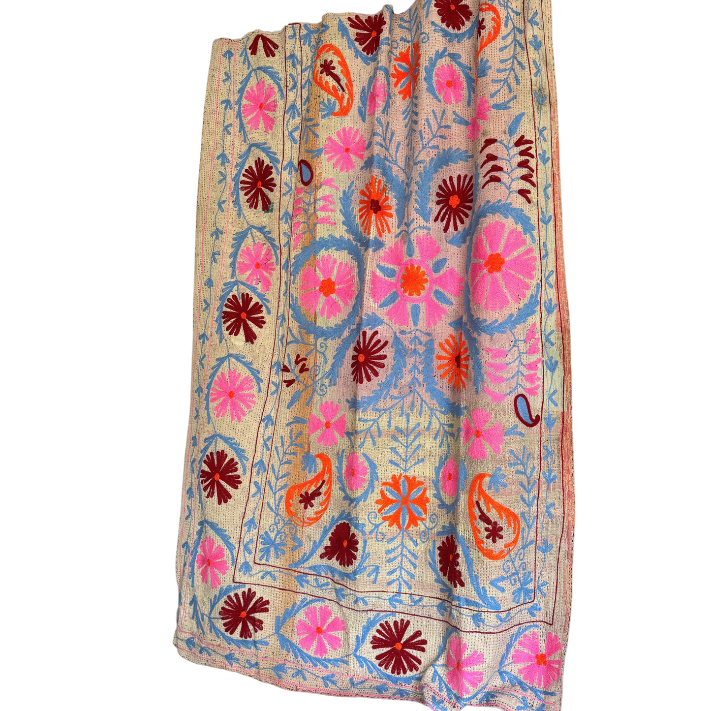 Close-up of pale-blue vine and burgundy daisy embroidery on cream sari cotton