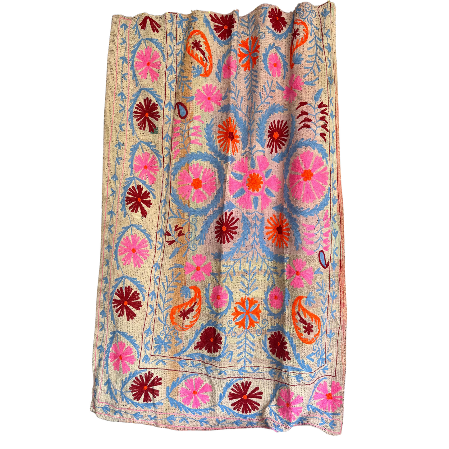 Full view of kantha textile with fuchsia-pink and tangerine floral medallion on cream background