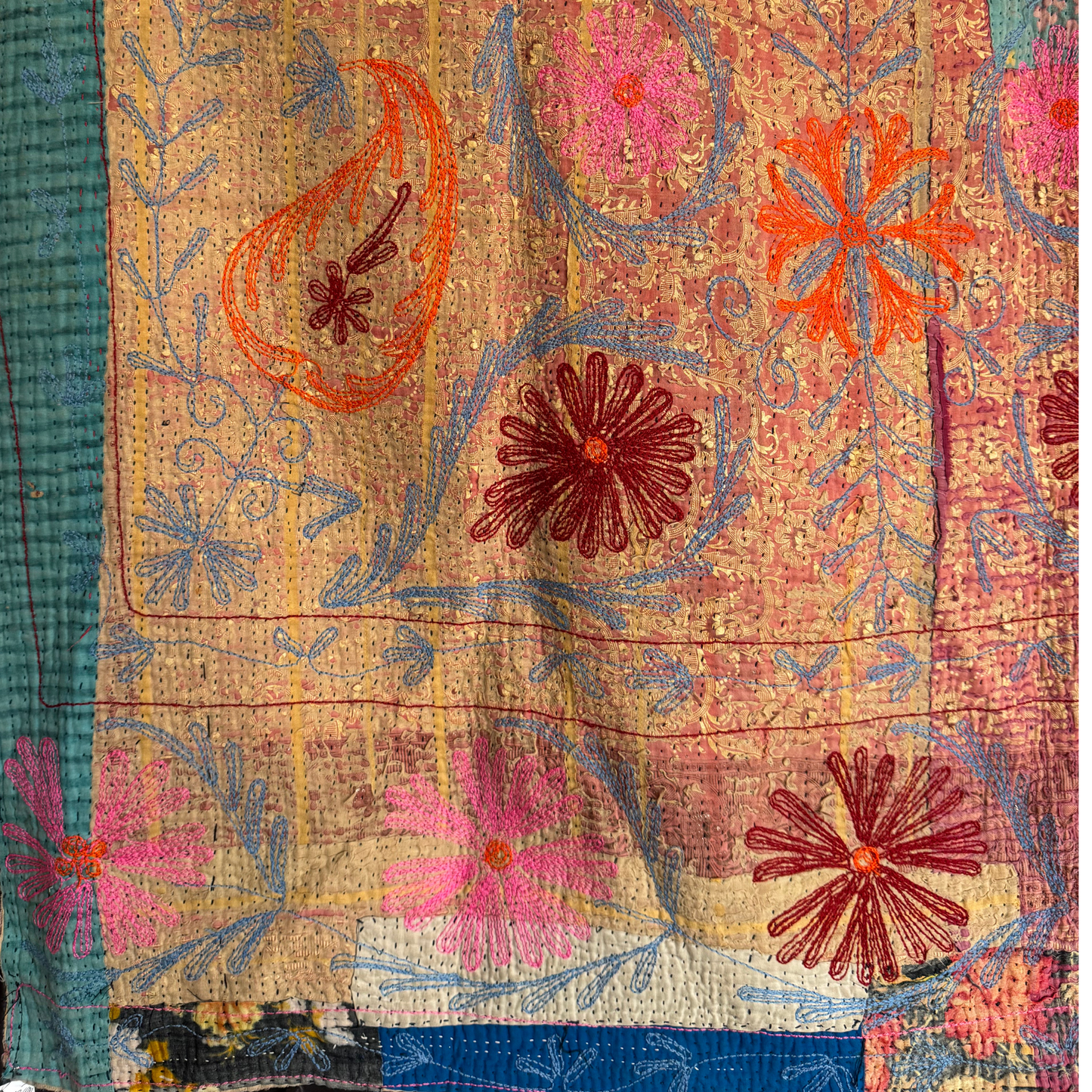 Full reverse view of kantha displaying embroidered front and stitched back