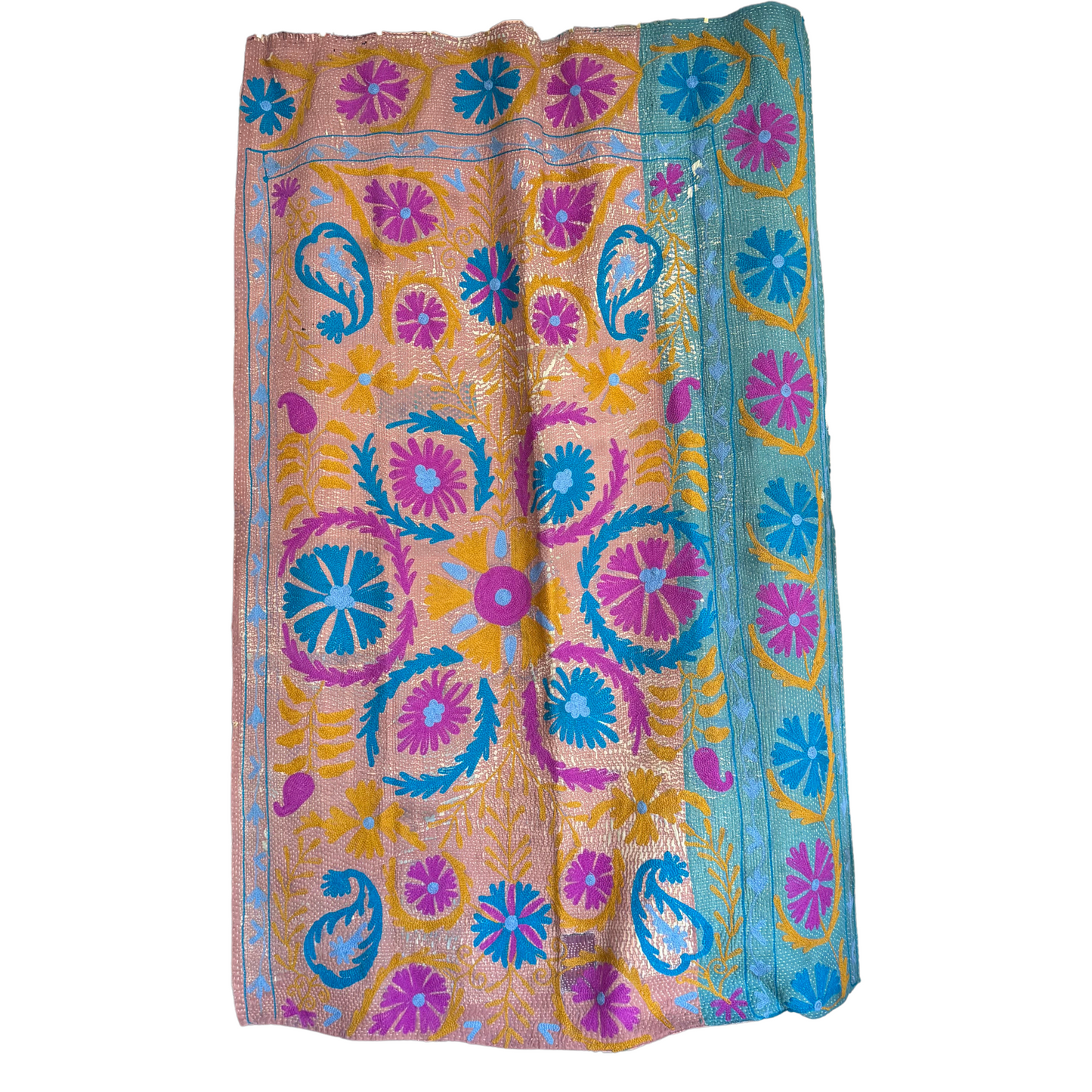 Full view of reversible kantha quilt with central mauve and terra floral medallion on rosé sari cotton