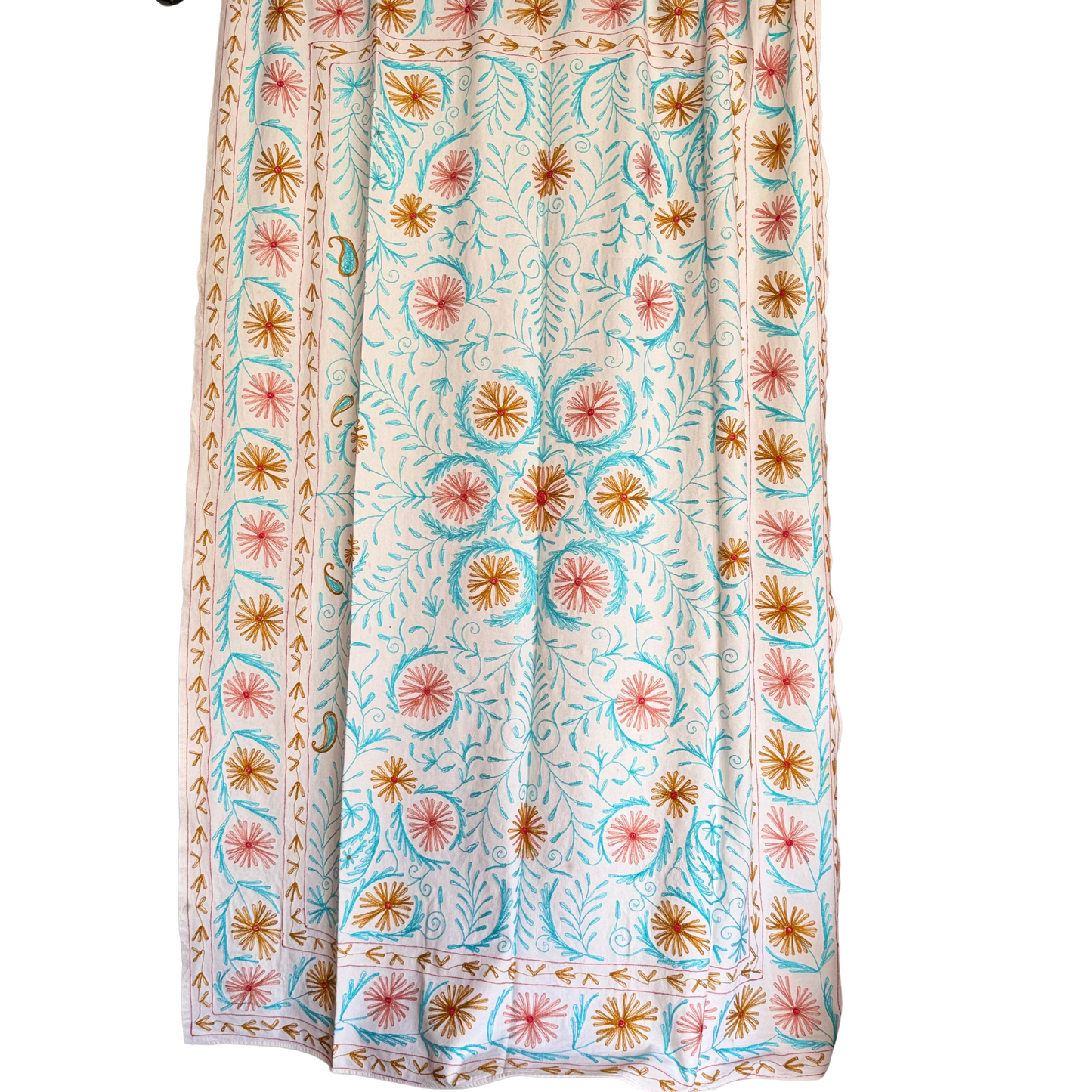 Full reverse view of suzani showing stitched back and patchwork of running stitches