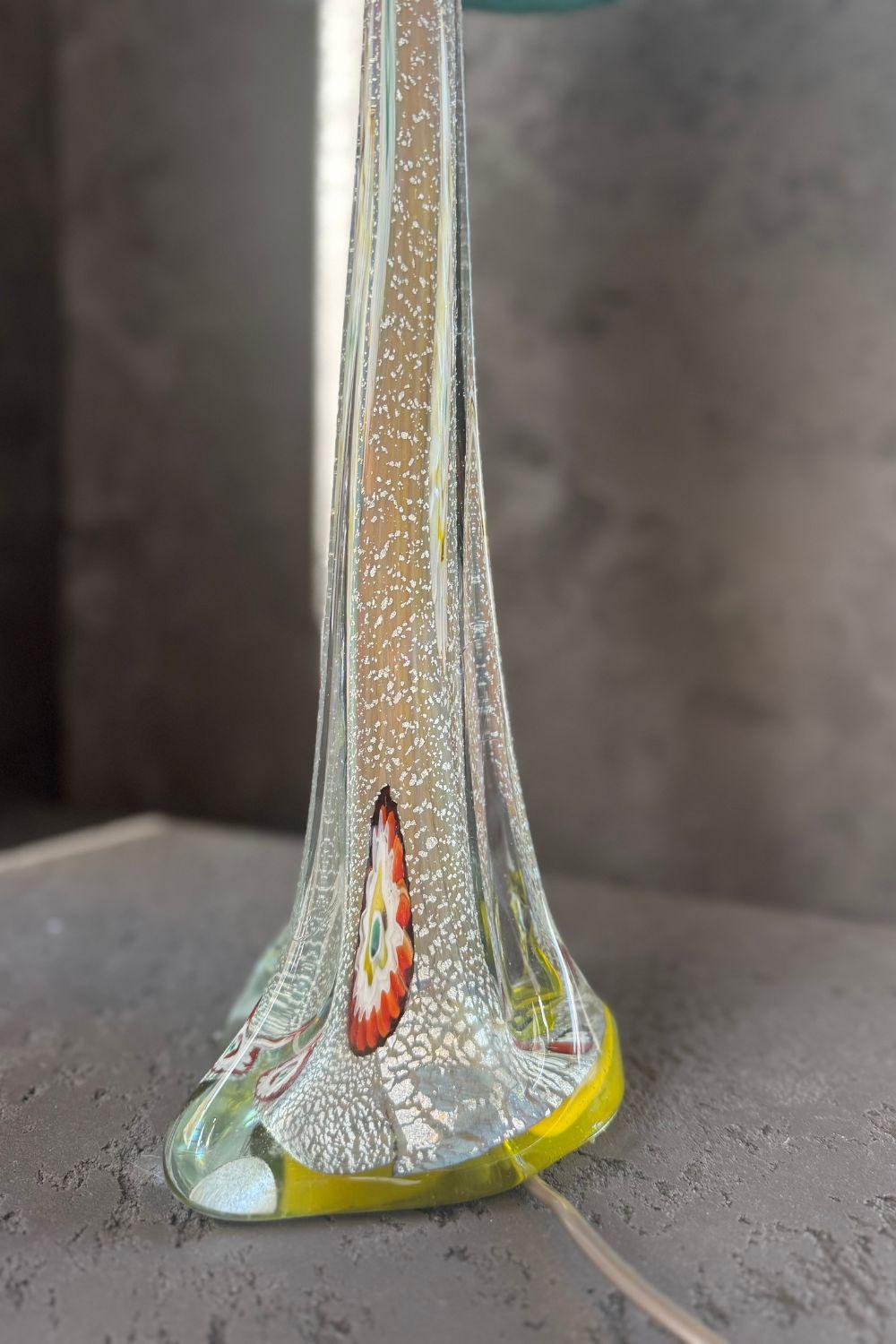 Close-up of the glass lamp base, showcasing the intricate color details and unique shap