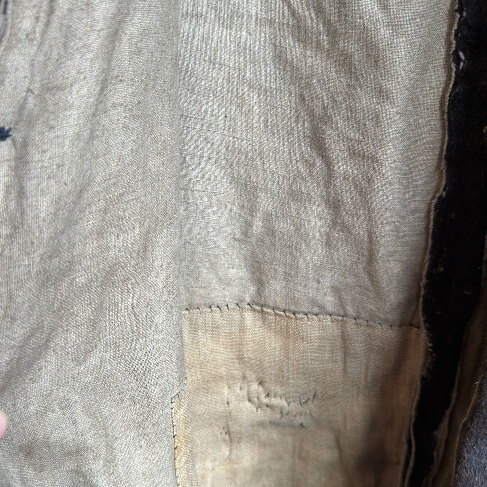  Interior of bear suit showing original cotton lining and hand-stitched seams.