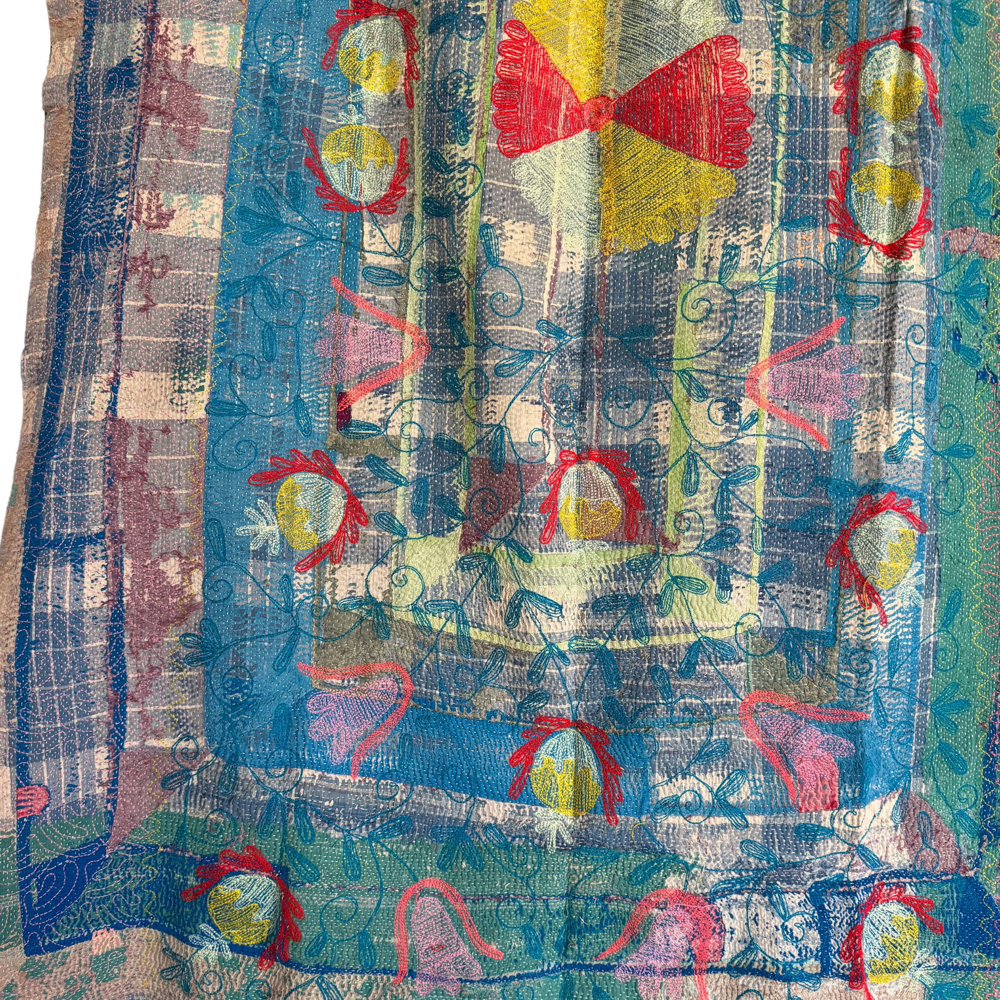 Back view detail of yellow-cream floral medallions and vine embroidery on Kantha cotton throw