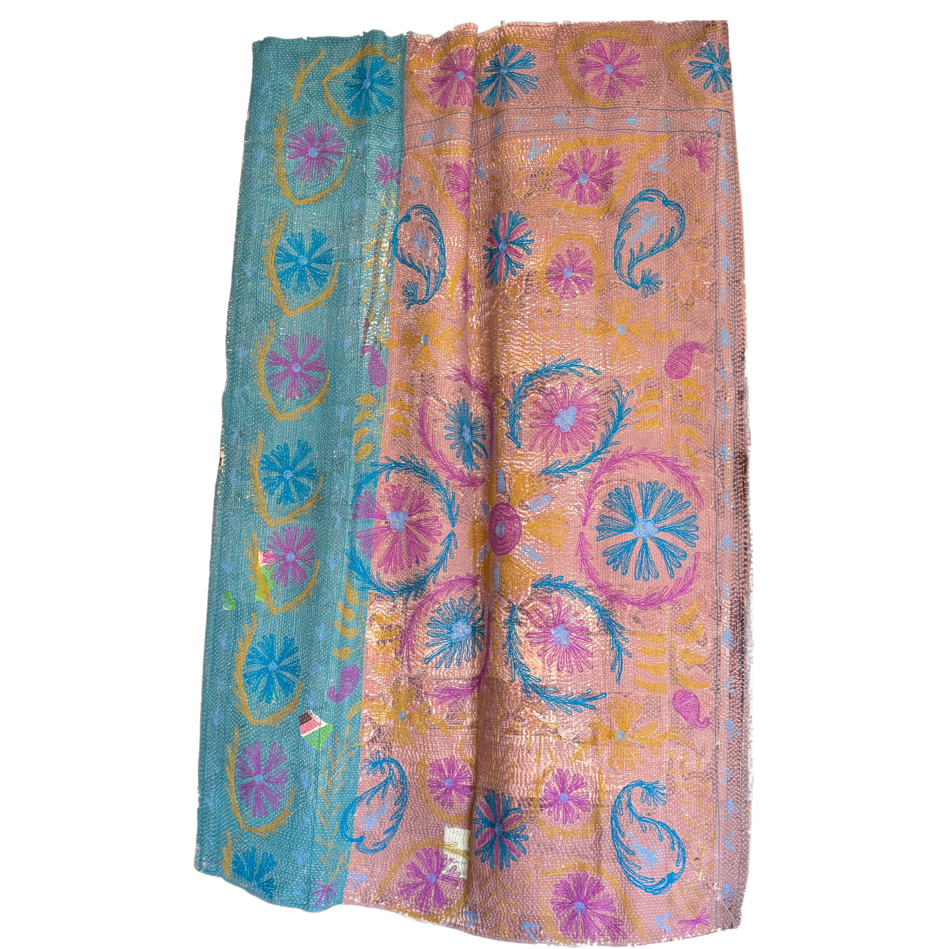 Reverse side of textile with charcoal stem-and-leaf block print on cream, accented by hand-stitches