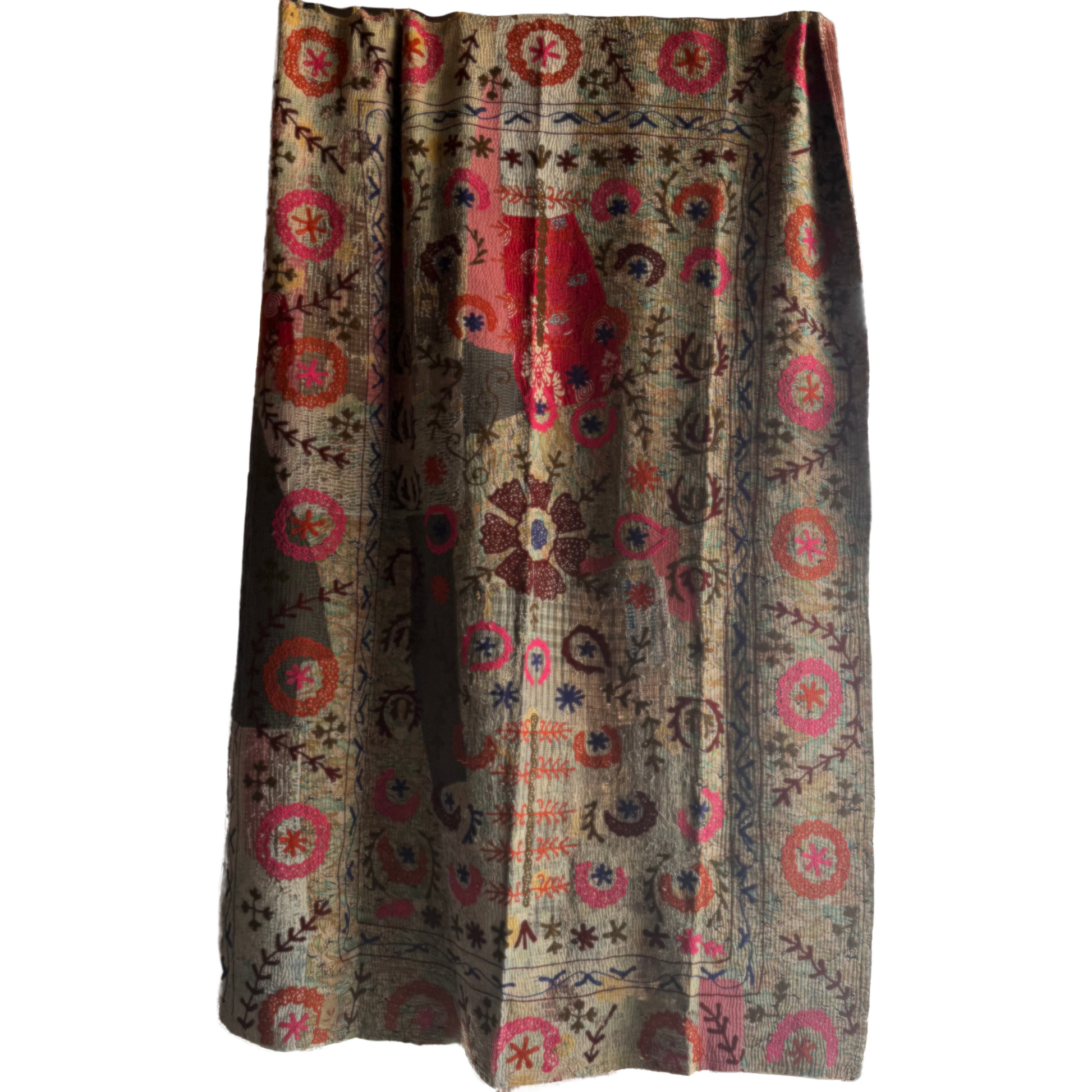 Alternate full-front shot showing the entire embroidered panel on beige cotton