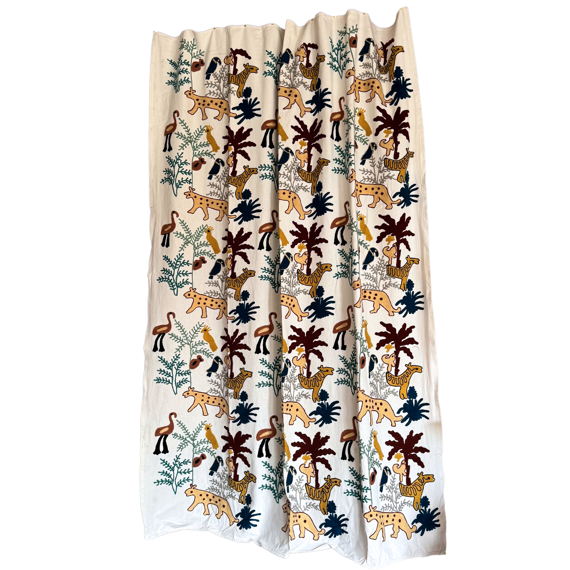Full front view of white cotton suzani with mustard leopards, navy toucans, rust palms and green ferns